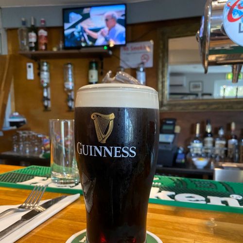 Pint of guinness on bar counter www.fernhillcountryclub.com_v2